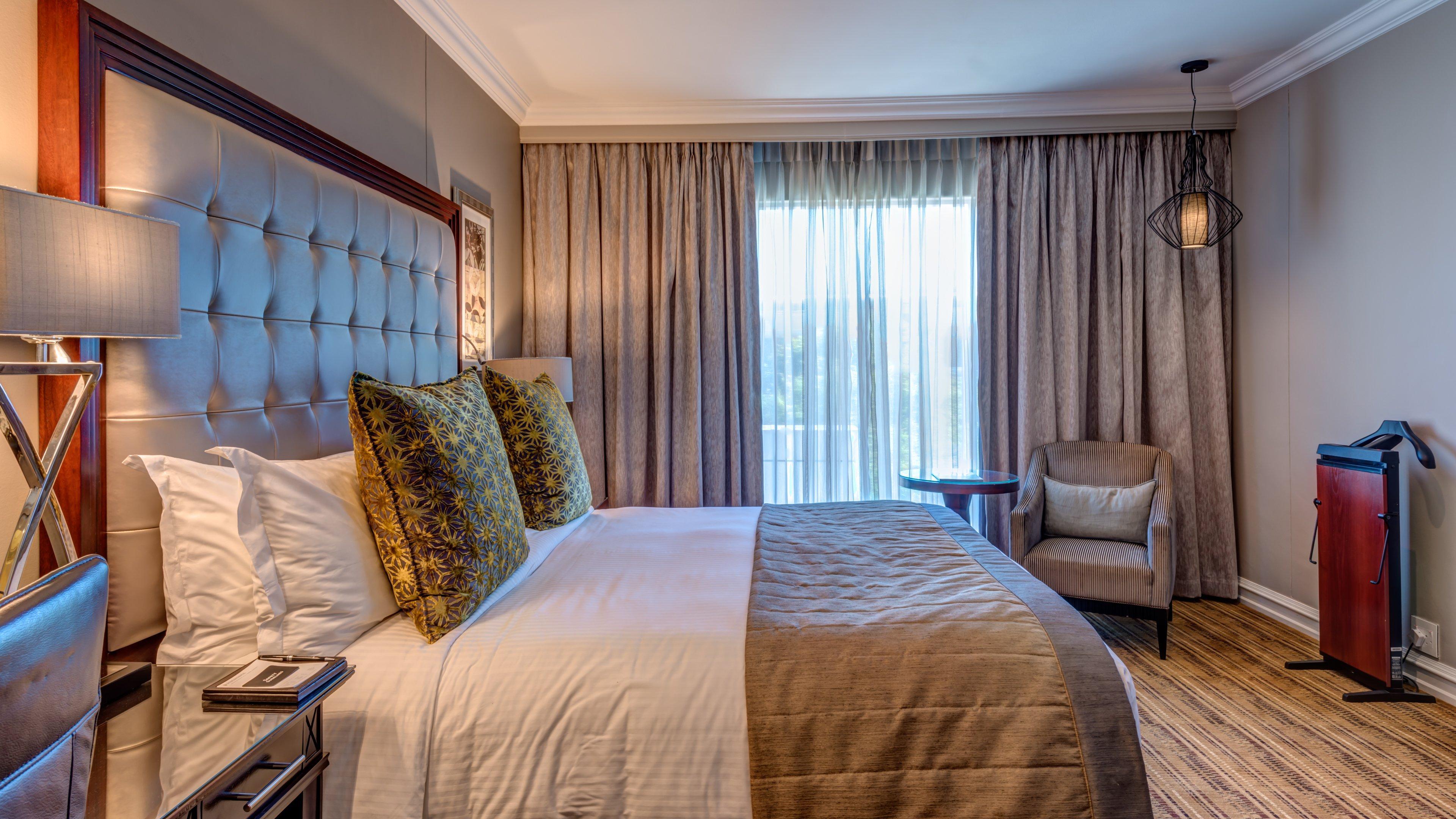 Intercontinental Johannesburg Or Tambo Airport Hotel By Ihg Kempton Park Kültér fotó A bedroom at the hotel